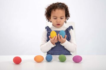Huevos de madera de colores 7 unidades