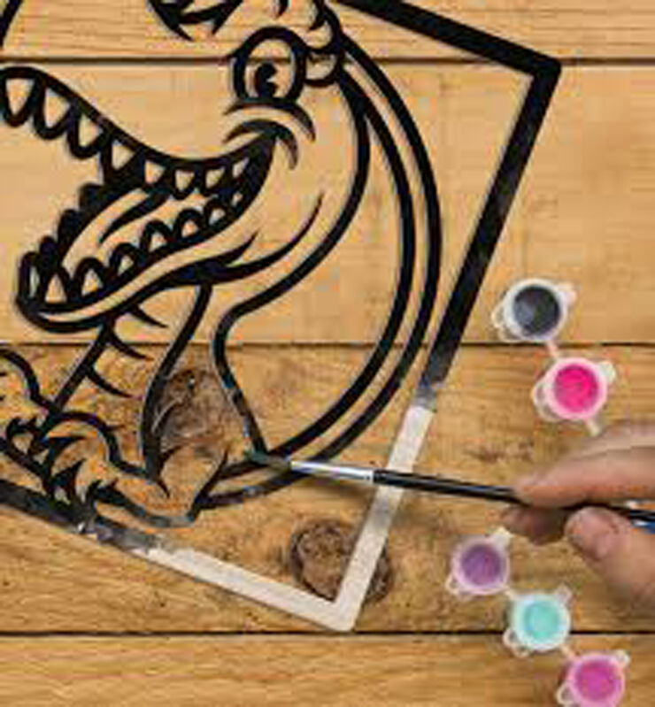 Art en fusta dinosaure